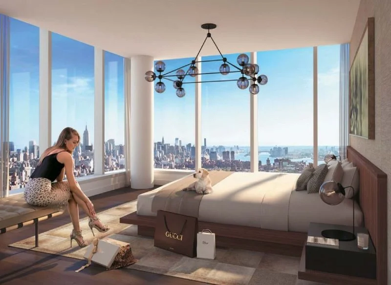 Woman in luxury apartment with city skyline view.